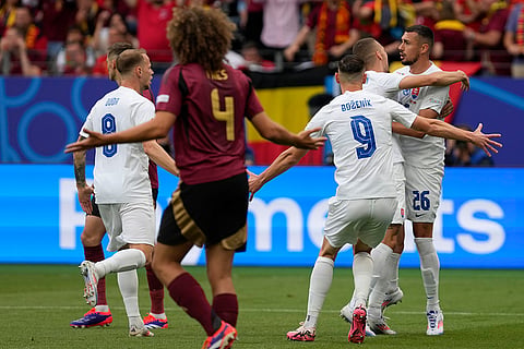 Slovakia's players celebrates opening goal